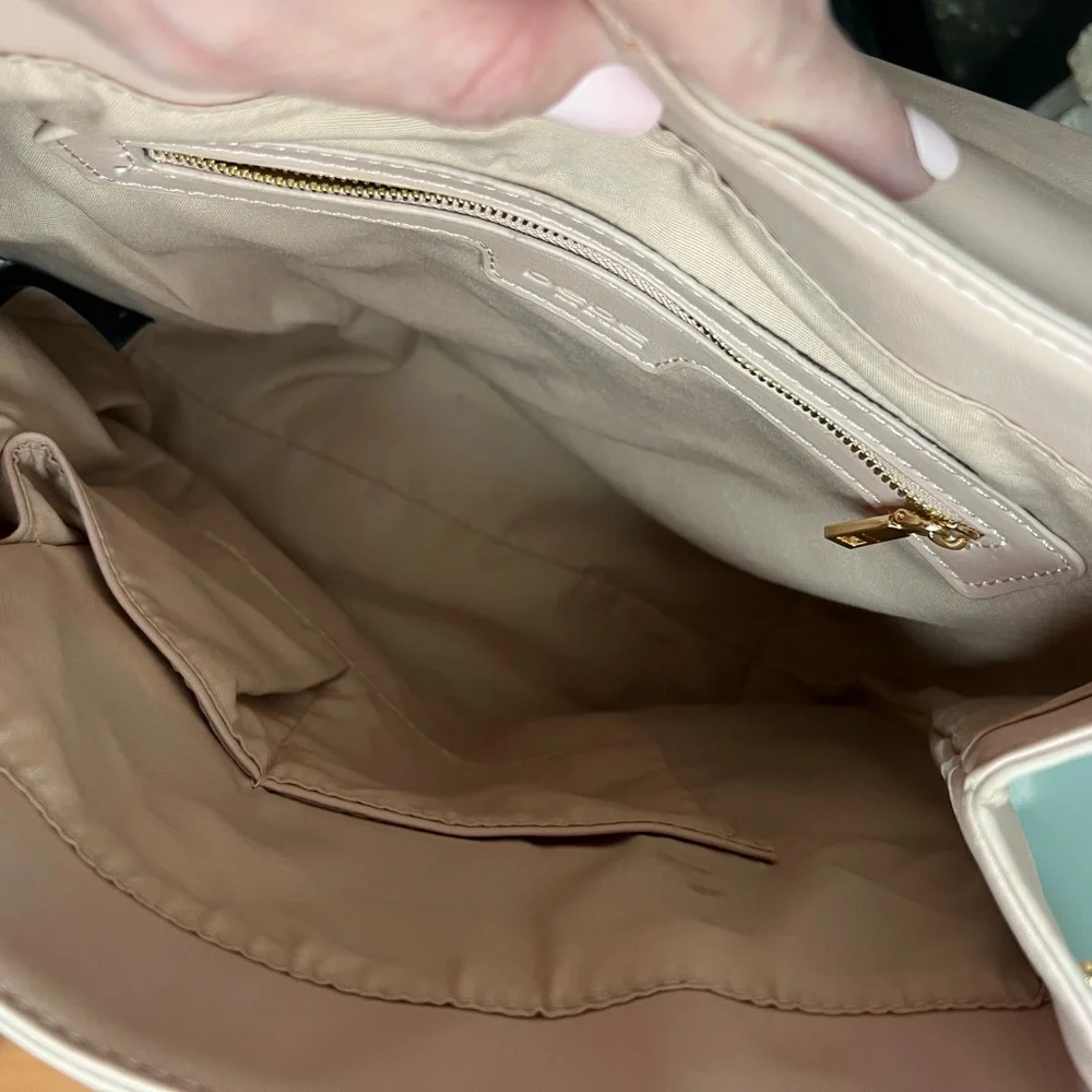 Bebe Blush Pink Backpack. Vegan leather. Lots of pockets.